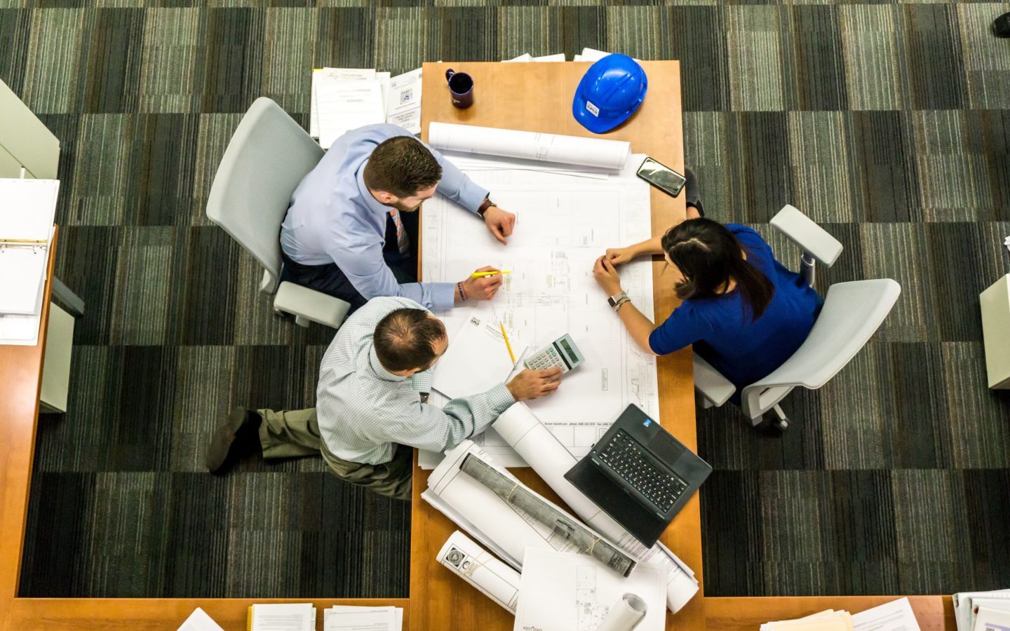 Architect Contractors Reviewing BluePrints