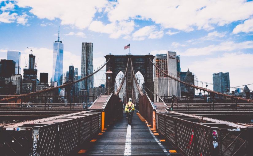 First responder walking across Brooklyn bridge