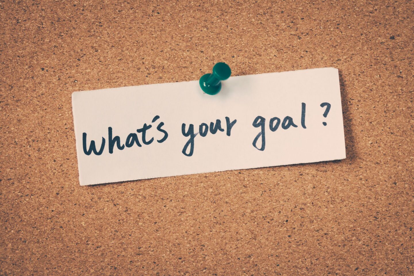 Purpose-Driven Goals What's Your Goal message on corkboard